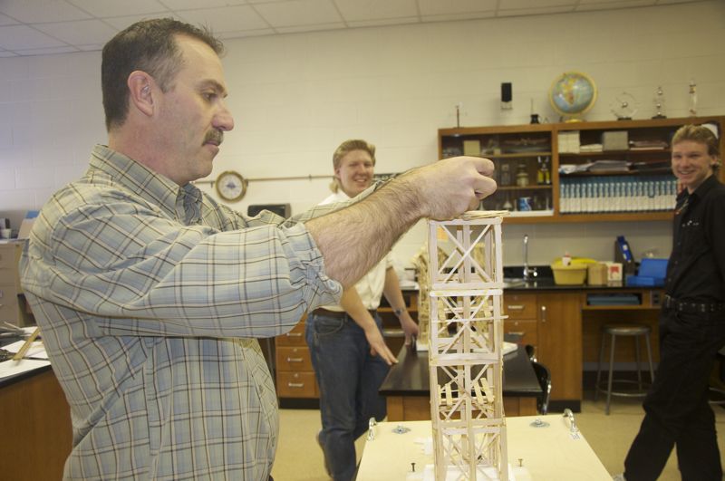 Mr. Custer readies a tower to be shook.