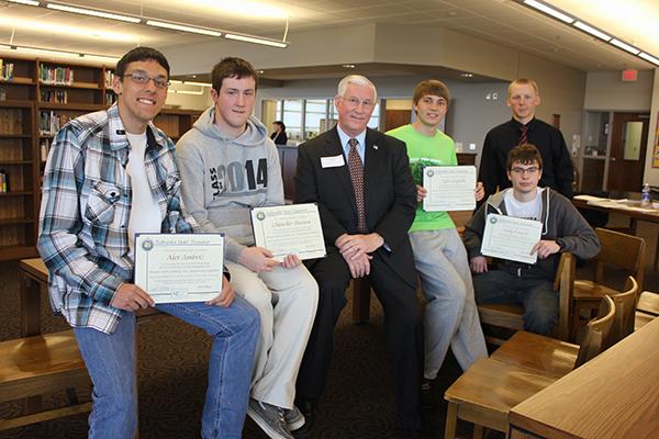 State Treasurer Don Stenberg stands with a group of students that had just been certified. 