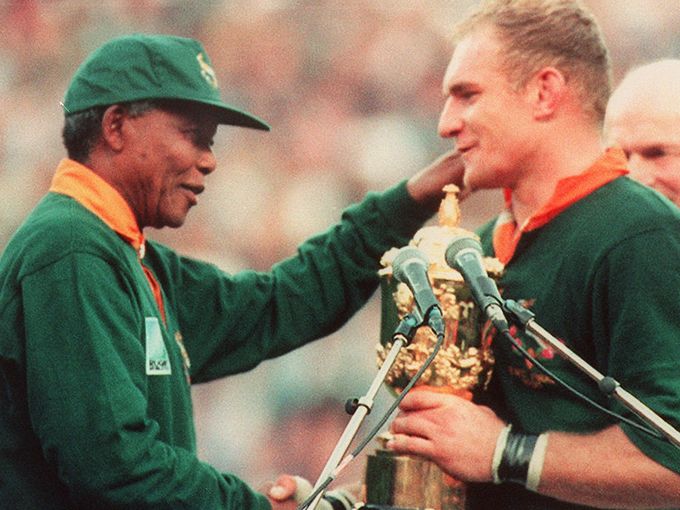 Nelson+Mandela%2C+left%2C+greeting+and+congratulating+South+African+rugby+player%2C+Francois+Pienaar%2C+who+won+the+Gold+Cup+for+South+Africa+in+the+Rugby+World+Cup.
