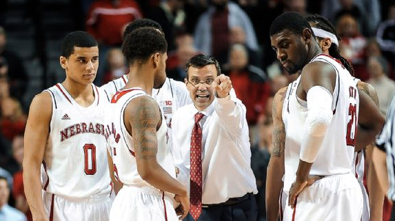 Coach Tim Miles directs players during a game.