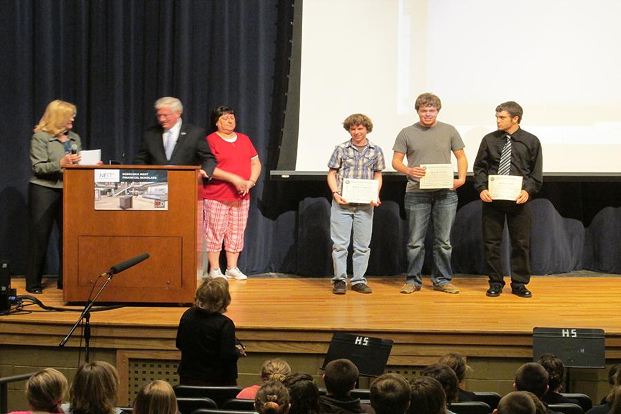 The second place team receives awards from the State Treasurer.