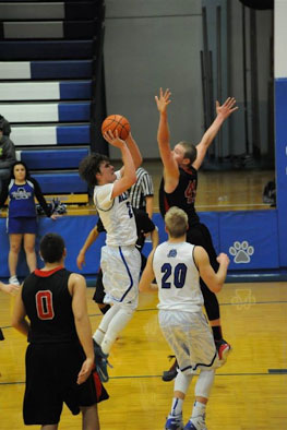 Jordan Mills puts up a shot against Scottsbluff earlier this season. 