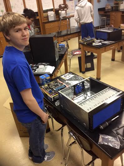 Nathaniel Johns assembling his computer